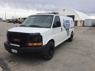 Fleet of Always On Call service vans parked in a row